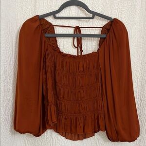 Lucy Paris Orange Smocked Puff Sleeve Blouse